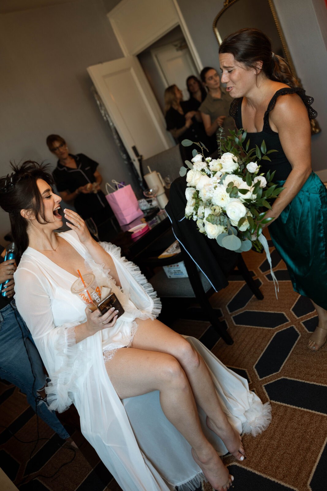 Kelsey seeing her bridal bouquet for the first time