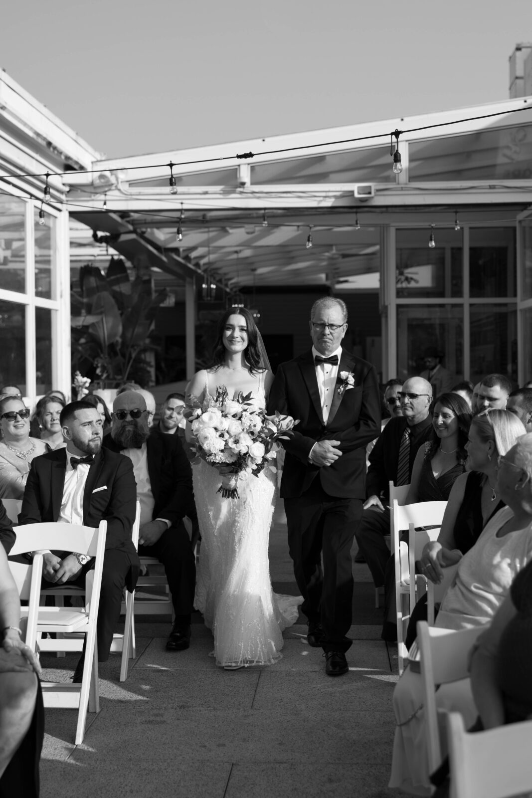 Kelsey walking down the aisle to Dylan | Providence RI