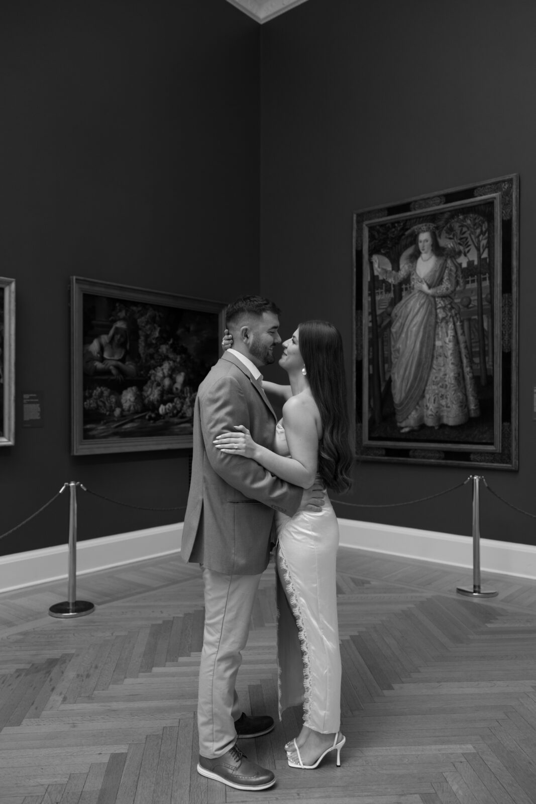 Tori and Blake embracing in RISD Museum