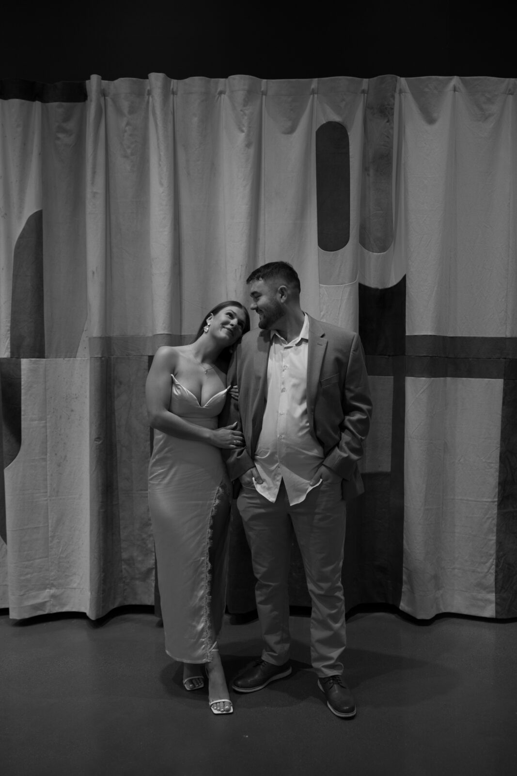 Couple posing in front of canvas art at RISD Museum