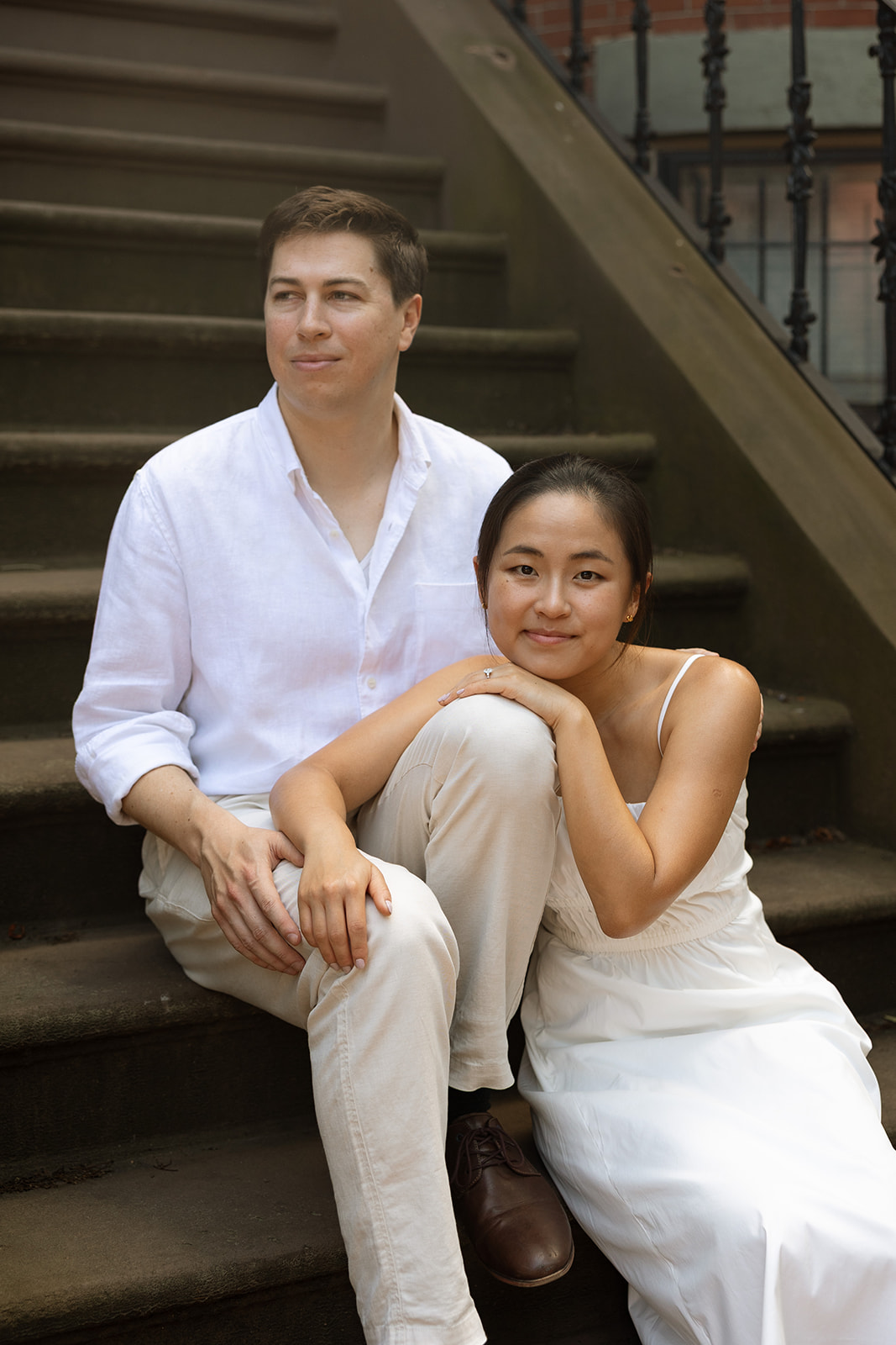 Jess & Reid photographed on brownstone steps