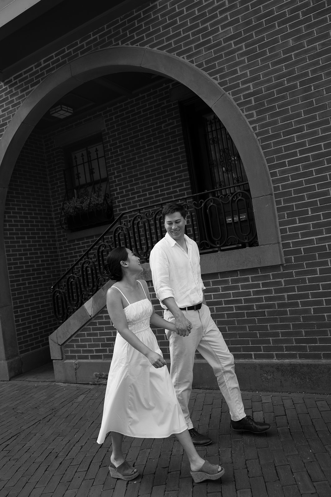 Jess & Reid walking around Bostons Back Bay