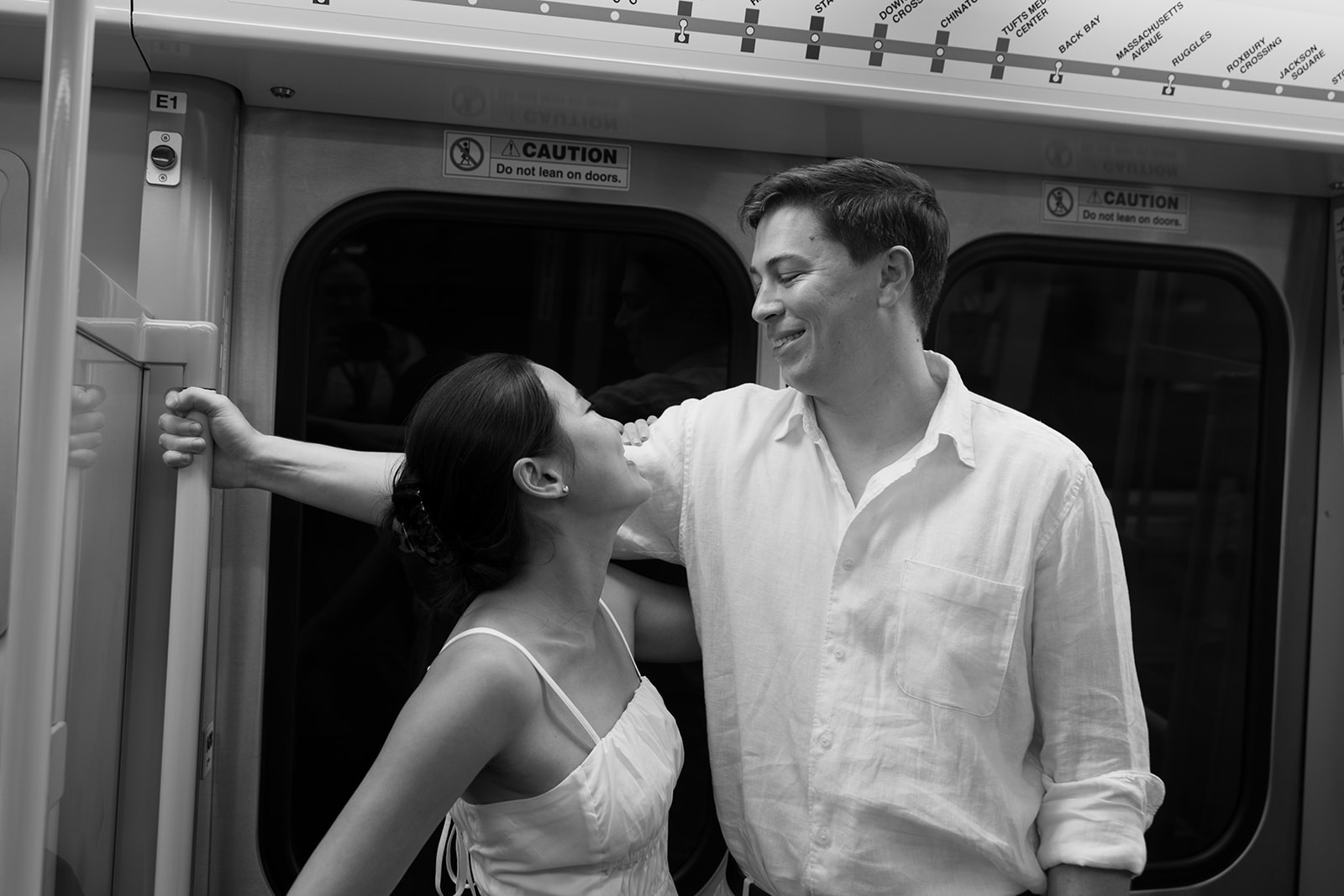 Jess & Reid photographed on the Orange Line