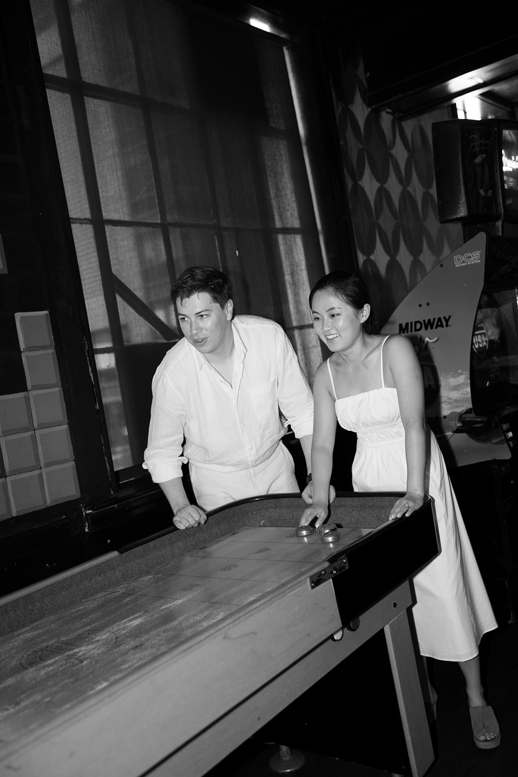 Couple Playing Arcade Games at Versus Boston