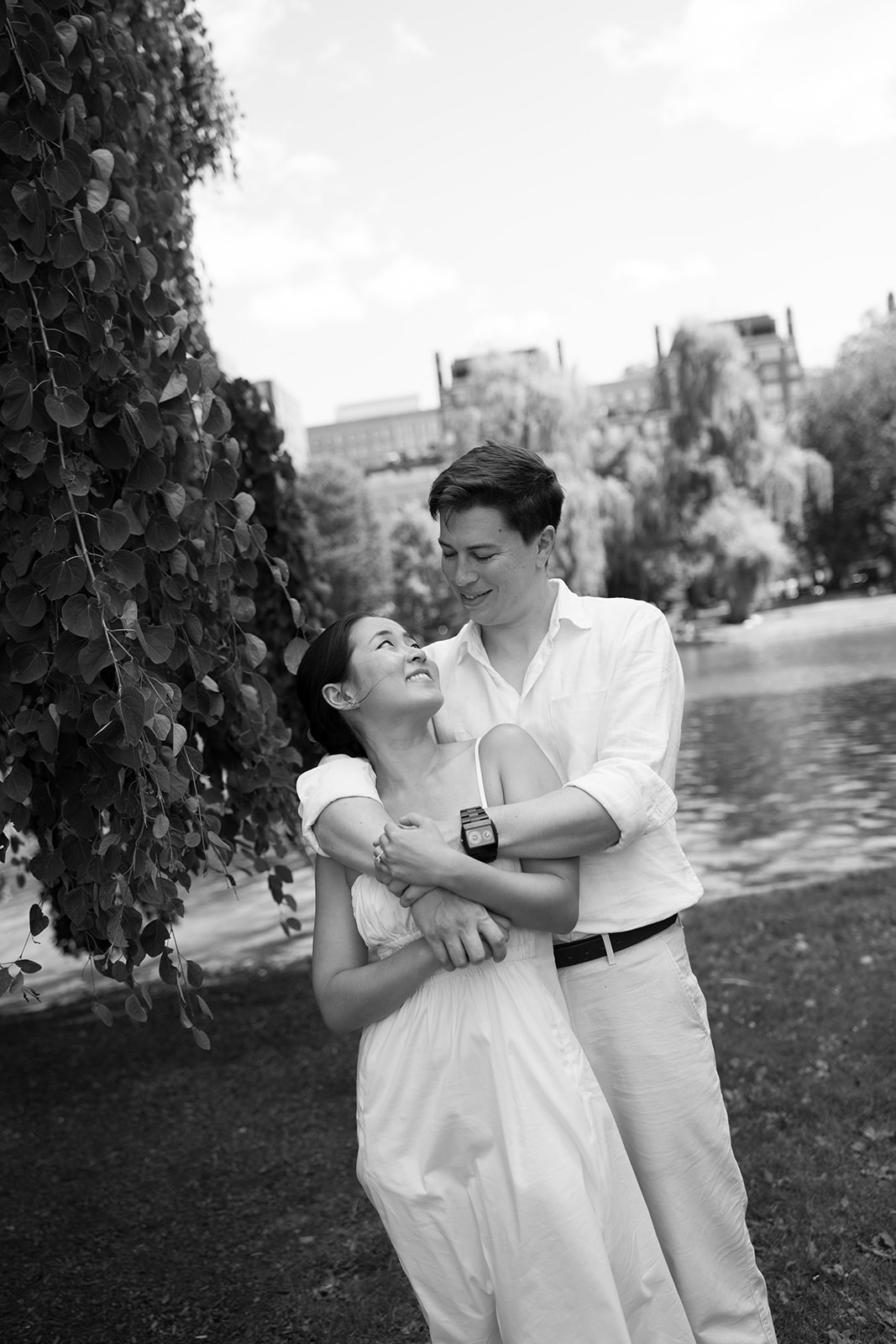 Jess & Reid Embracing near the Pond